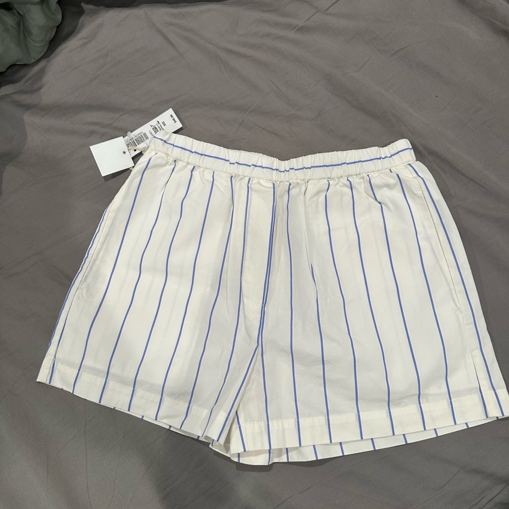 White Shorts with Blue Stripes